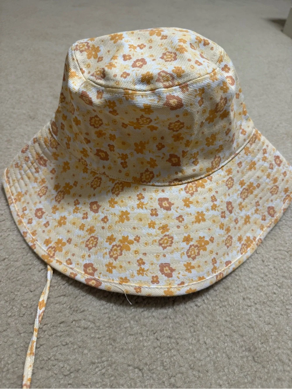 Lack of Color Holiday Bucket Hat in Floral Pattern with Chin Ties